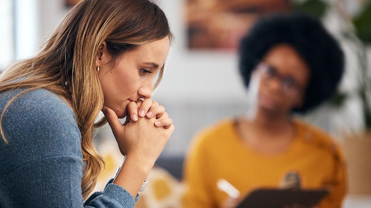 grief overload woman in therapy