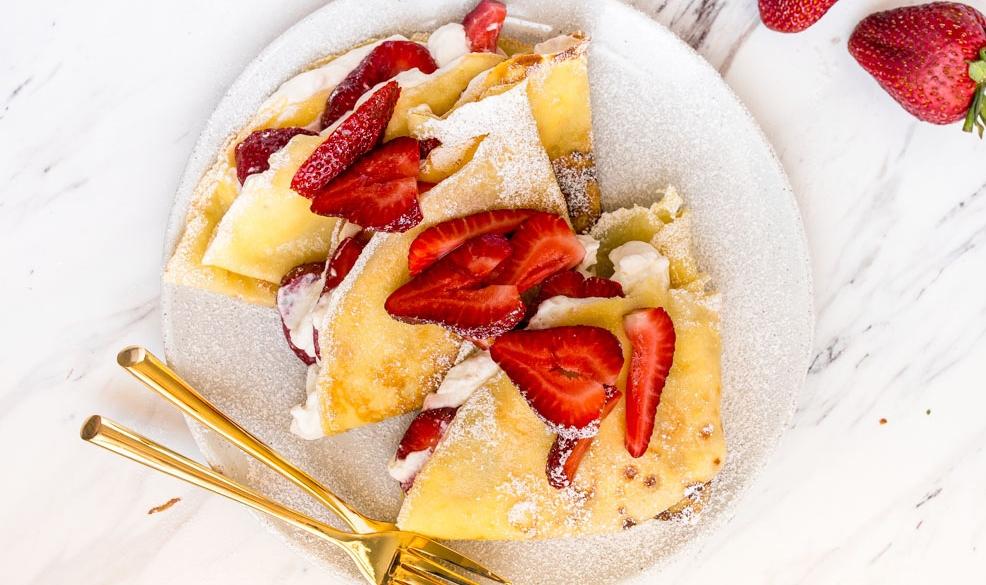 Article Cards Featured Image Crepe recipe topped with strawberries