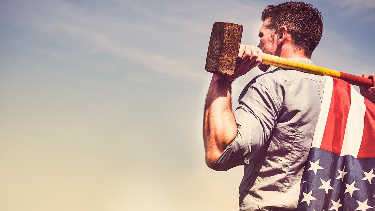 Article Cards Featured Image Attractive guy with a sledgehammer and a US flag on his shoulder