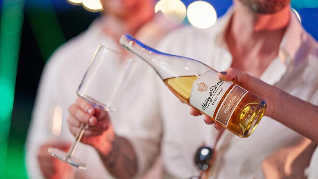 A photo of pinot gris being poured into a glass