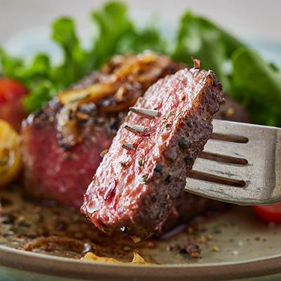 Mango recipes with a slice of steak on the fork.